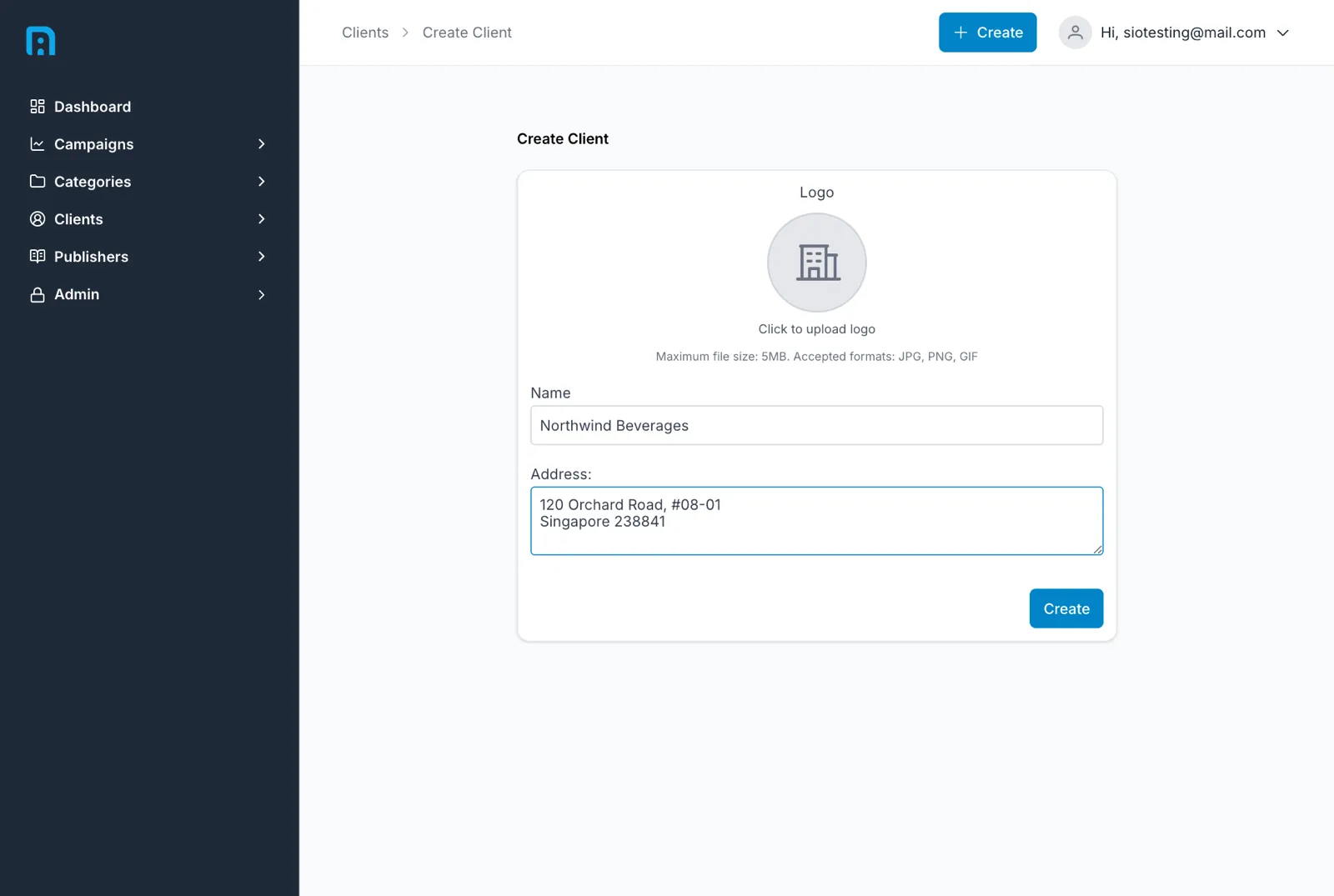 The create-client form filled in with a name and a multi-line address